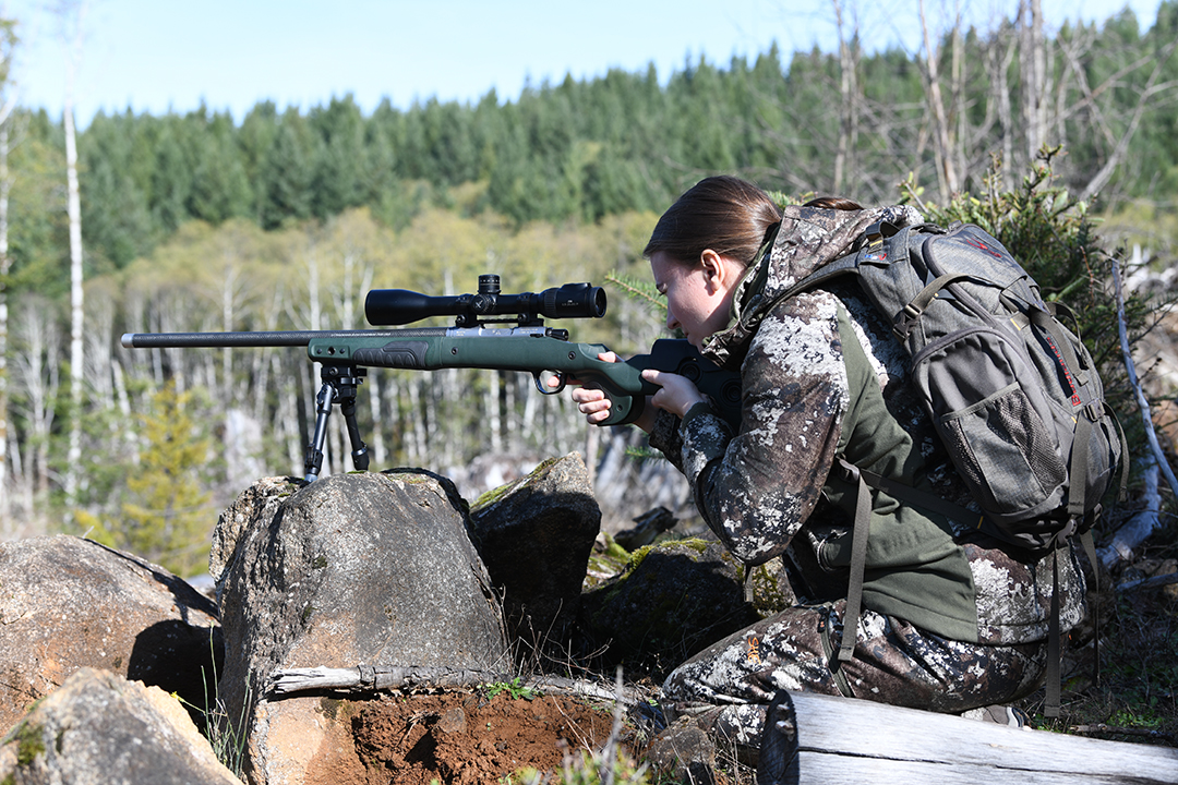 Shooting from a bipod on a rock