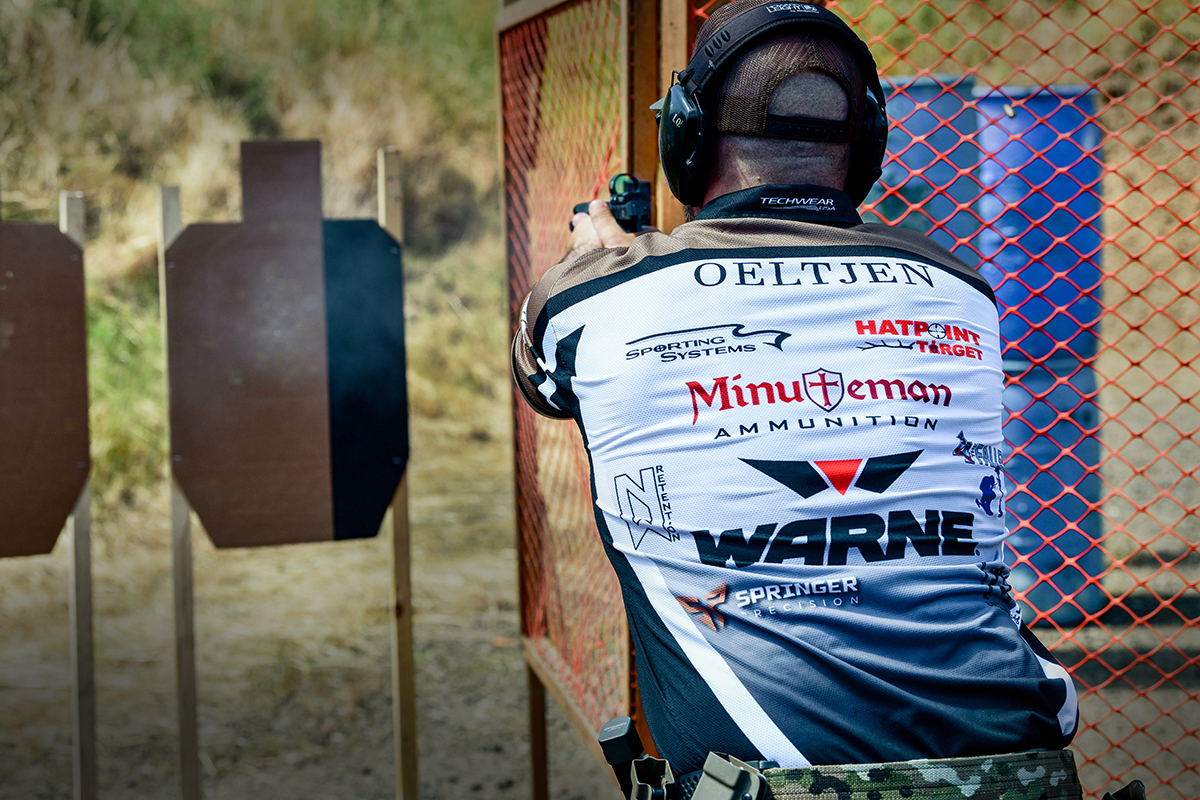 competitive shooter with pistol