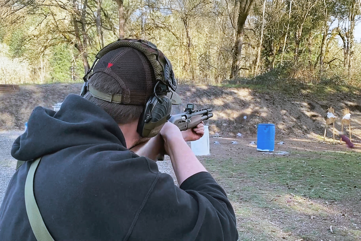 competitive shooter with shotgun