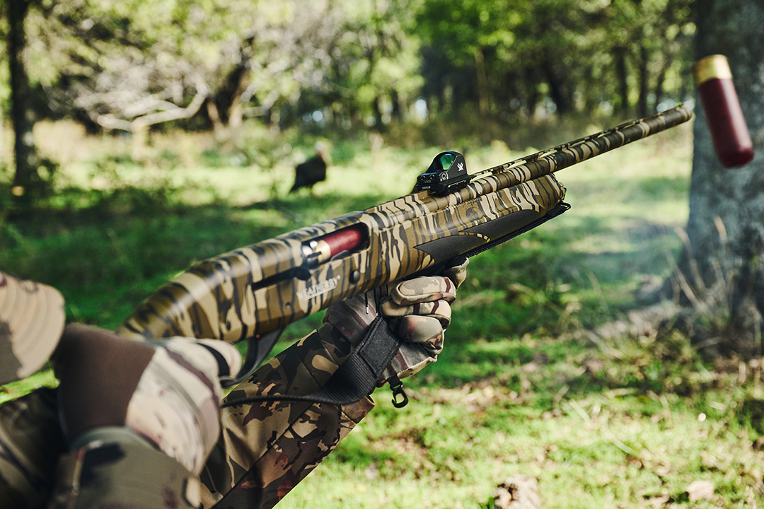 shooting a turkey with a red dot and shotgun rib mount